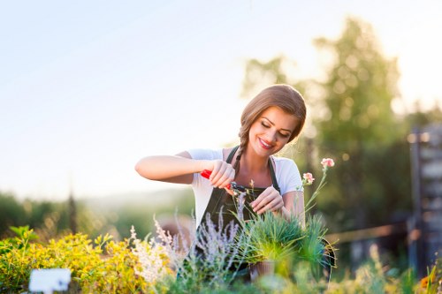 Responsible gardening team maintaining safety standards during regular work