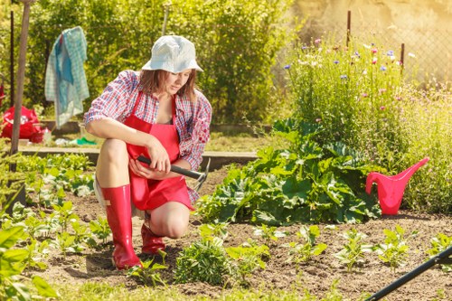 Gardening team preparing a client property for scheduled outdoor maintenance